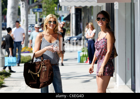 Stephanie Pratt and Audrina Patridge filming scenes for MTV's 'The Hills' on Robertson Boulevard while shopping at Anya Stock Photo