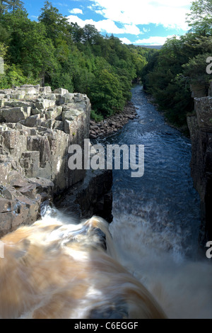 Gushing water of the River Tees, over High Force Waterfall in Teesdale, County Durham Stock Photo