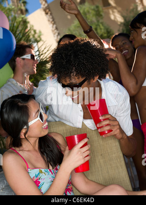 USA, Arizona, Scottsdale, Young people having fun at party Stock Photo