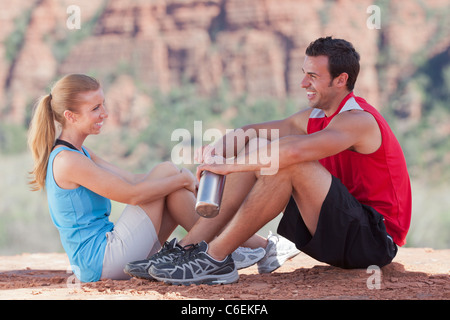 USA, Arizona, Sedona, Young couple enjoying view in desert after hiking Stock Photo