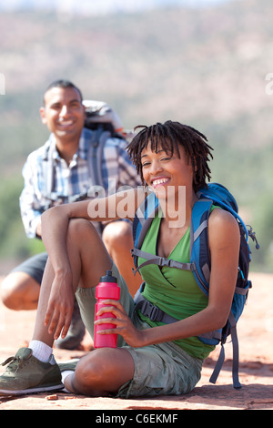USA, Arizona, Sedona, Young couple hiking and enjoying desert scenery Stock Photo