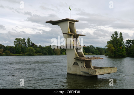 Concrete diving platform in Coate Water Country Park, Swindon, built in 1935 and now a Grade II listed building. Lake swimming was banned in 1958. Stock Photo