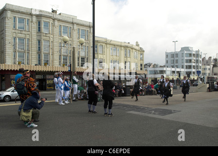 Morris Dancers on Worthing seafront in West Sussex. Stock Photo