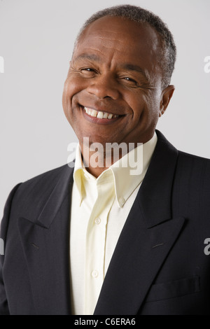 Portrait of mature businessman, studio shot Stock Photo