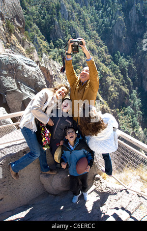 President Felipe Calderon of Mexico takes a photo of his family at the rim of Copper Canyon Stock Photo