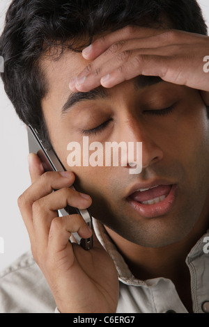 Portrait of young man, studio shot Stock Photo