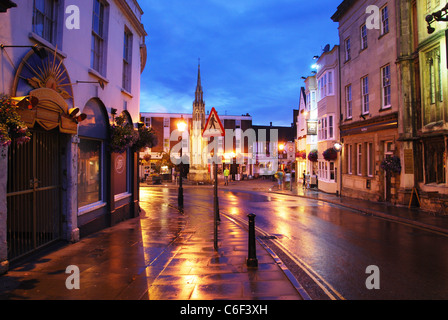 Glastonbury High Street and Market cross Somerset England at dusk Stock Photo