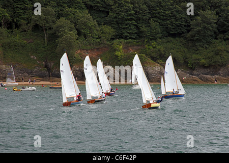 Salcombe yawl dinghies racing in the Salcombe Estuary, Devon, England, UK Stock Photo