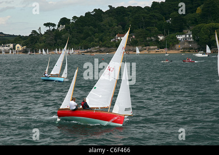 Salcombe yawl dinghies racing in the Salcombe Estuary, Devon, England, UK Stock Photo