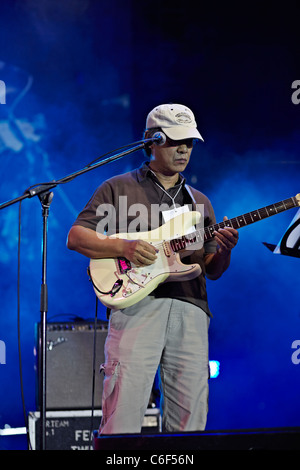 Guitarist player on stage Stock Photo