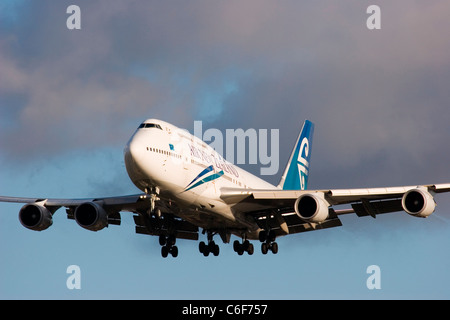 Air New Zealand Boeing 747-4F6 landing at London Heathrow airport. Stock Photo