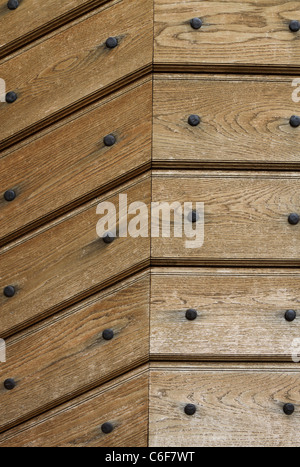 wooden background or texture with iron rivets Stock Photo