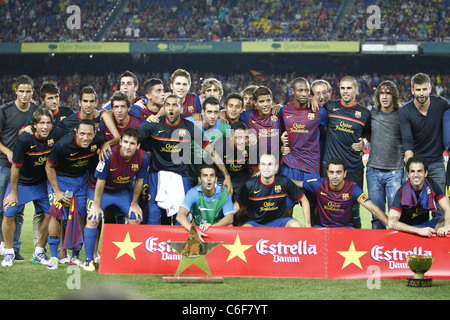 Barcelona team group celebrating  their victory at the end of the 'Joan Gamper Trophy ' match between Barcelona and Napoli. Stock Photo