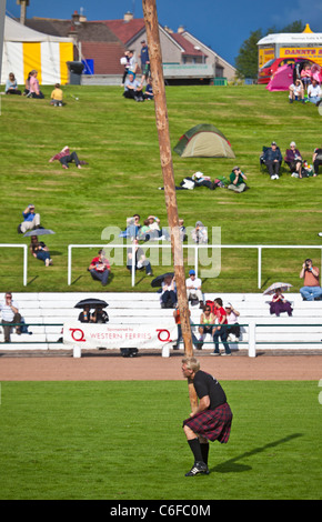 Man tossing the Caber, athlete, athletic, attire, caber toss, clan ...