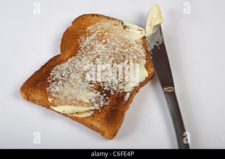 Brown wholemeal bread buttered toast Stock Photo