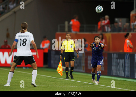 Aya Sameshima of Japan (15) throws the ball into play during a 2011 Women's World Cup quarterfinal soccer match against Germany. Stock Photo