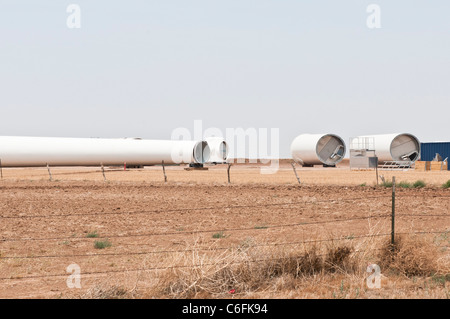Components for a horizontal-axis wind turbine are located to a construction site near Amarillo, Texas. Stock Photo