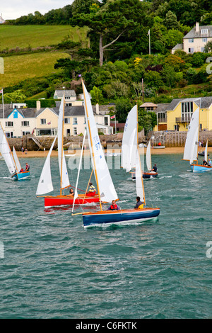 Salcombe yawl dinghies racing in the Salcombe Estuary, Devon, England, UK Stock Photo