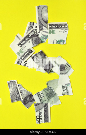 Lacerated banknote looking as dollar sign Stock Photo