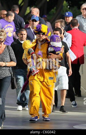 Celebrities watch the LA Lakers vs. the Golden State Warriors at the