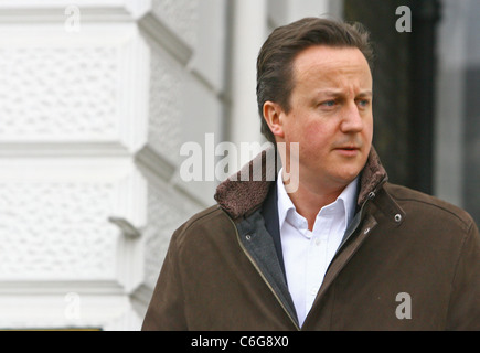 David Cameron makes his way home after taking his children to school Stock Photo