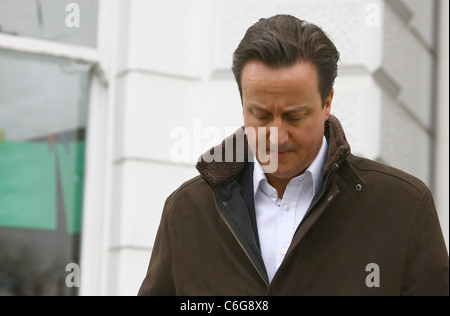 David Cameron makes his way home after taking his children to school Stock Photo