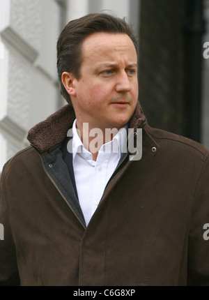 David Cameron makes his way home after taking his children to school Stock Photo