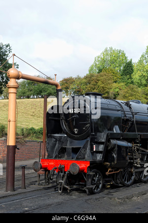 British Railways Standard Class 9F locomotive No. 92212  in the sidings at Bridgnorth Station on the Severn Valley Railway Stock Photo