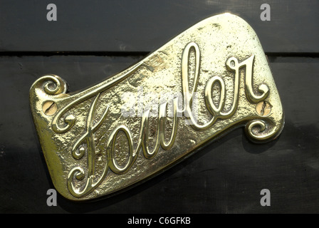 A Fowler emblem / badge displayed on a Fowler Steam Traction Engine. Stock Photo