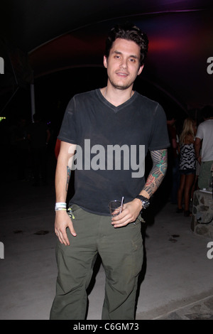 John Mayer holding a drink and posing for photographs at the 2010 Coachella Valley Music and Arts Festival - Day 1 Indio, Stock Photo