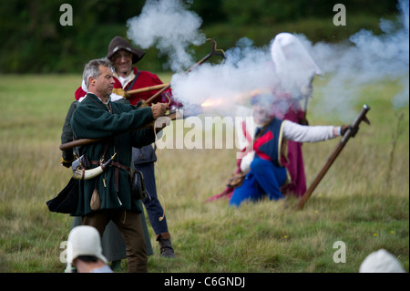 Display of medieval firearms and cannons by the Compagnie of Seint Barbara at the medieval festival held at Herstmonceux castle Stock Photo