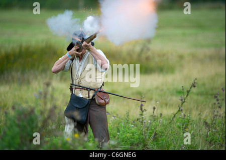 Display of medieval firearms and cannons by the Compagnie of Seint Barbara at the medieval festival held at Herstmonceux castle Stock Photo