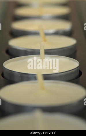 Macro Shot of Tea Light Candles in a Line Formation Stock Photo