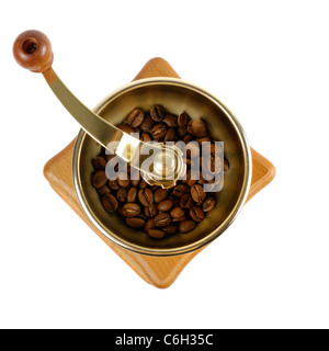 Coffee grinder with coffee beans close-up Isolated over white background Stock Photo