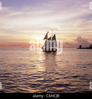 Ketch at sunset, Key West, Florida Keys, Florida, United States of America Stock Photo