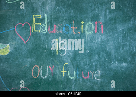 'Education is our future' written on the blackboard of a rural school Stock Photo