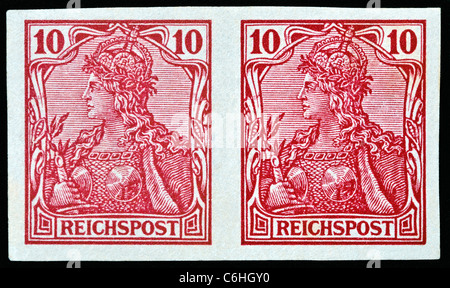 Pair of early forged German Germania stamps. Stock Photo
