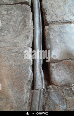 Bath England Roman lead pipe set into the limestone floor of the Roman ...