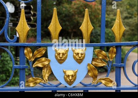 Traditional coat of arms of Shrewsbury 'Floreat Salopia' on the gates of Shrewsbury Quarry Shropshire England Uk Stock Photo