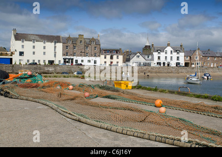 Fishing nets strewn in harbour at Stonehaven - Kincardienshire Stock Photo