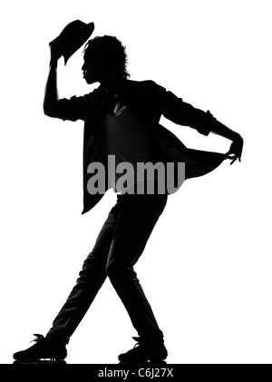 full length silhouette of a young man dancer dancing funky hip hop r&b on  isolated  studio white background Stock Photo