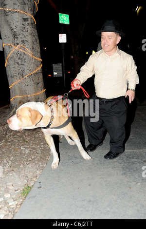 Shorty Rossi star of 'Pit Boss' outside Madeos restaurant with his dog Hercules Los Angeles, California - 17.02.10 Stock Photo