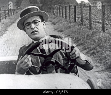 HAROLD LLOYD (1893-1971) US film actor and producer in the 1920 silent film 'Get Out and Get Under' Stock Photo