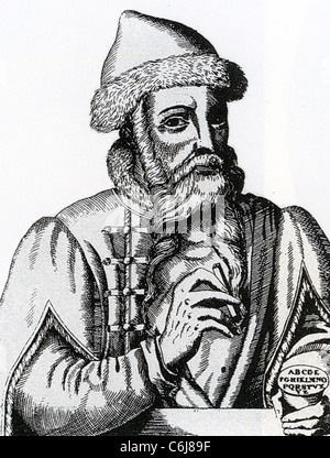 Johannes Gutenberg (1398-1468) German printer in his printing works. In ...