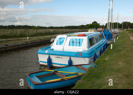Boats moored at Horsey Mere, Norfolk, England. Stock Photo