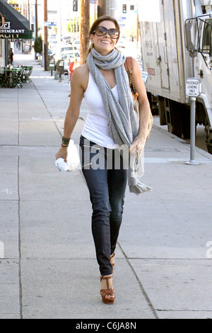 Brooke Burke arriving at a hair salon in West Hollywood while wearing a long gray scarf Los Angeles, California - 22.02.10 The Stock Photo