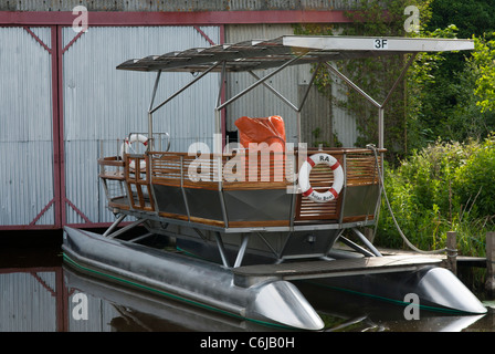 Ra, solar powered boat, Barton Broad, Norfolk, England. Stock Photo