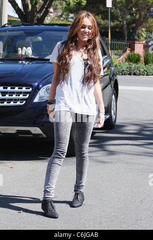 Miley Cyrus shows off her new Mercedes while out and about in Toluca Lake. Los Angeles, California - 15.03.10 Stock Photo
