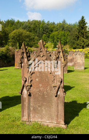 Gravestones at the Parish Church of St Cuthbert, Greenhead, Cumbria, England. Stock Photo