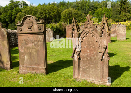 Gravestones at the Parish Church of St Cuthbert, Greenhead, Cumbria, England. Stock Photo